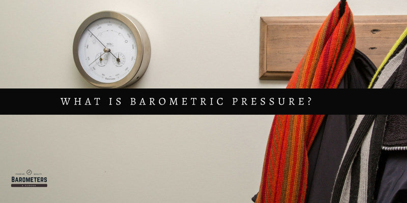 Wall-mounted barometer displaying air pressure near coat rack and scarves, barometric pressure concept