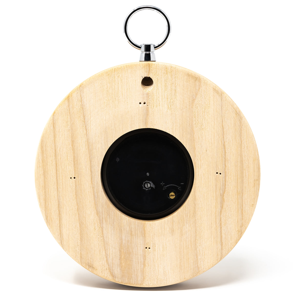Back of a round wooden weather instrument with chrome hanging ring, shown on white background