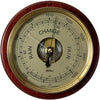 Traditional large German-made barometer with brass dial and wooden frame, weather indicators visible