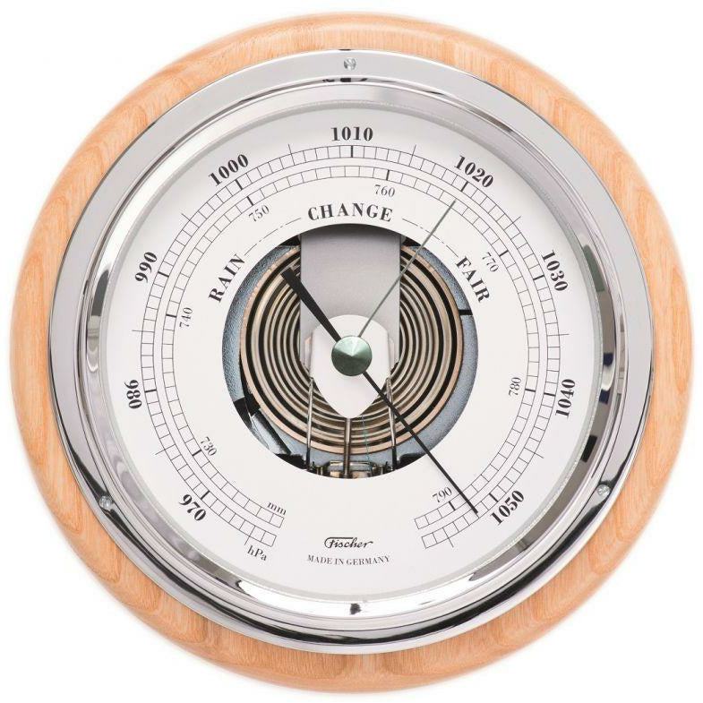 German analog barometer with wood frame and metal bezel, measures air pressure, wall-mounted