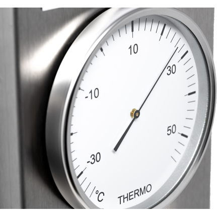 Close-up of a precision analog thermometer with stainless steel frame, Celsius scale visible.