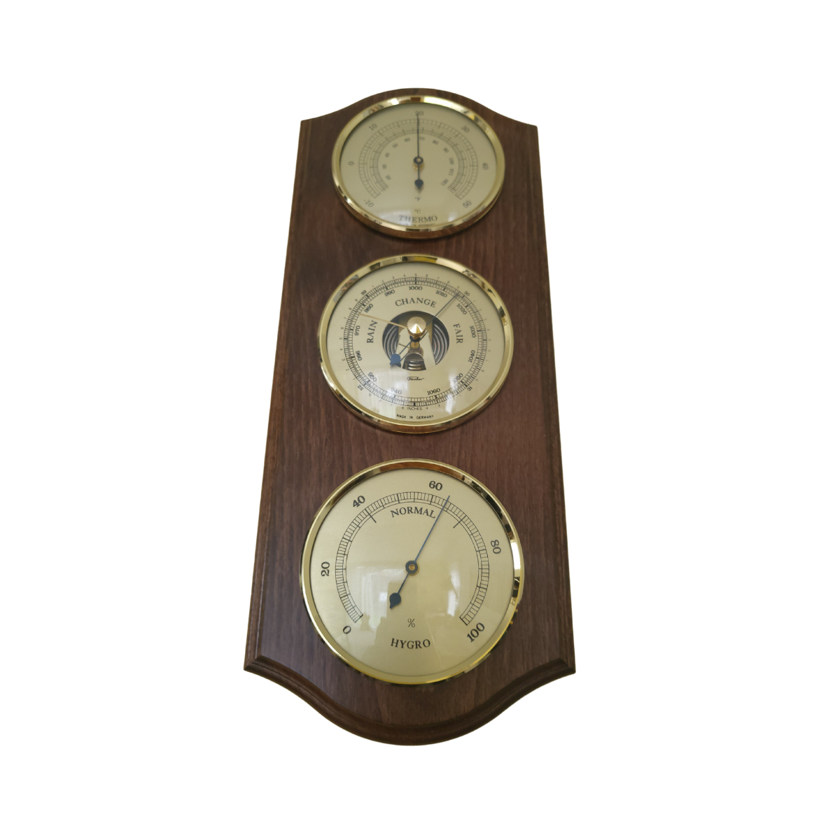 Wooden wall-mounted weather station with barometer, hygrometer, and thermometer dials