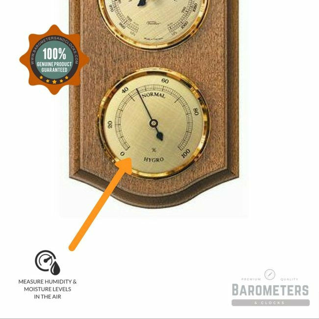 Wall-mounted rustic oak weather station with brass hygrometer and barometer dials