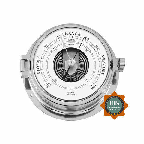 Nautical barometer in polished metal case with weather readings and guarantee badge