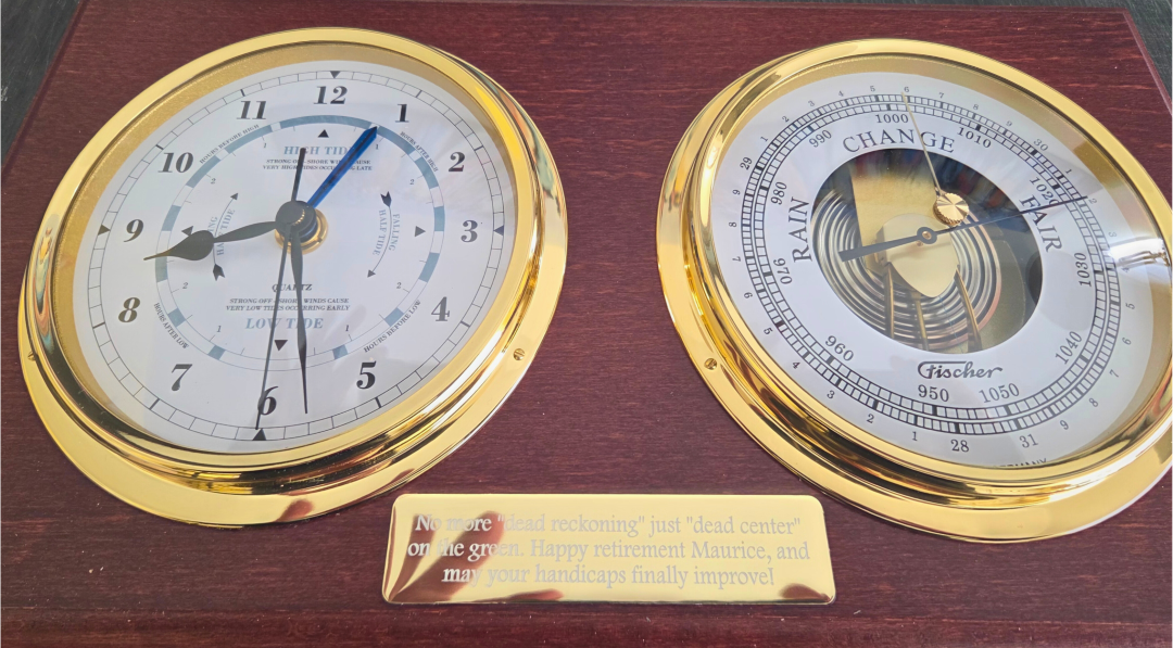 Elegant brass tide clock and barometer set on wood plaque, nautical weather instruments